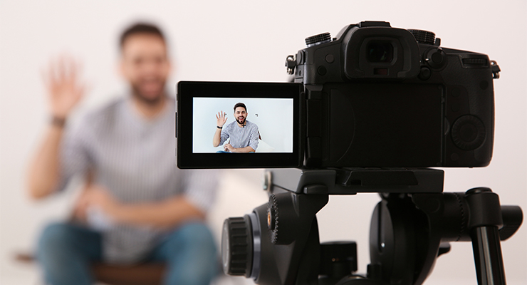 Male sitting in front of camera as he discusses digital marketing trends.